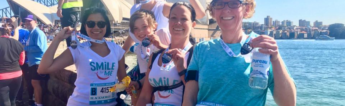Smile for ME team running the Bridge Run